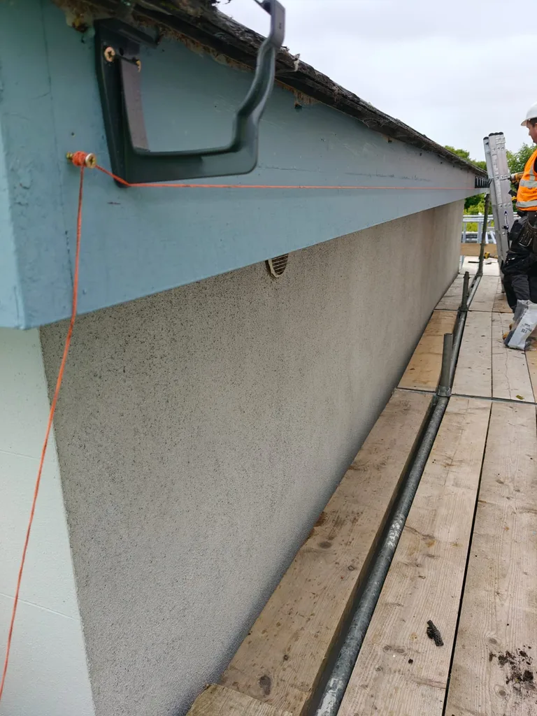 Guttering near me — Munster Gutters working on a fascia and gutter